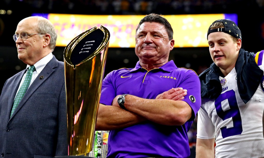 Ed Orgeron stands on stage after leading the LSU Tigers to the 2019 National Championship.
