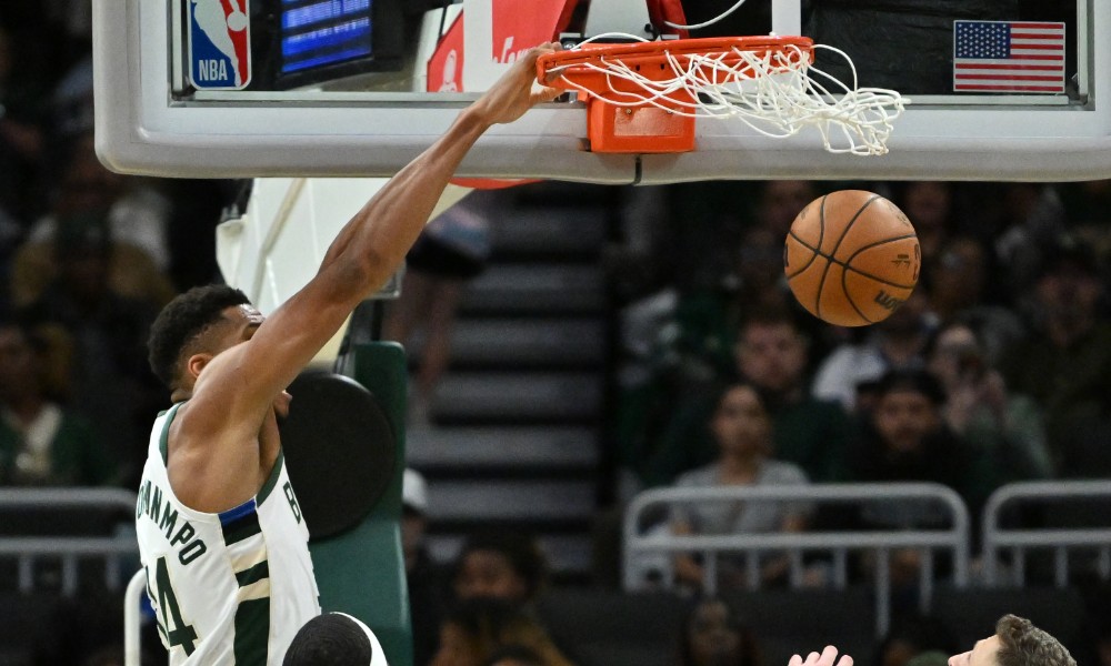 Giannis Antetokounmpo slam dunks