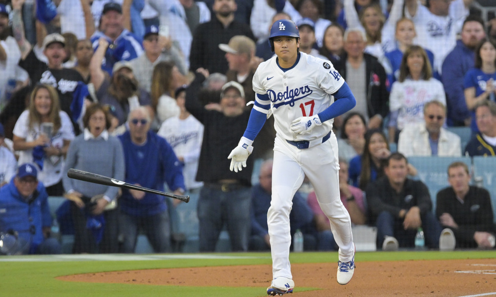 L.A. Dodgers pitcher Shohei Ohtani jogs to first base after hitting a solo home run in the first inning of their game four matchup against the Milwaukee Brewers.