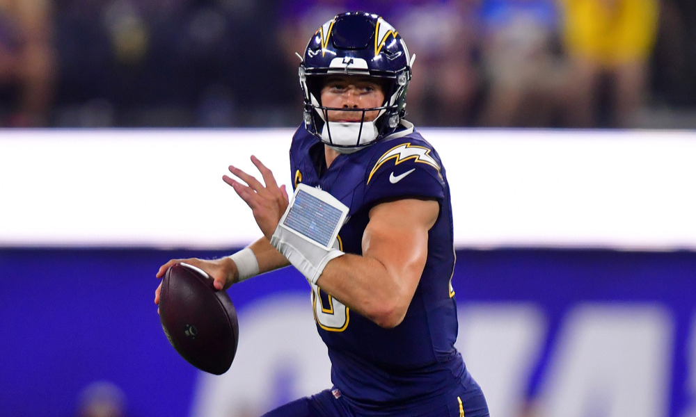 Justin Herbert drops back to pass against the Minnesota Vikings.