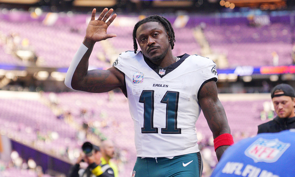 Philadelphia Eagles wide receiver A.J. Brown waves to spectators as he leaves the field.
