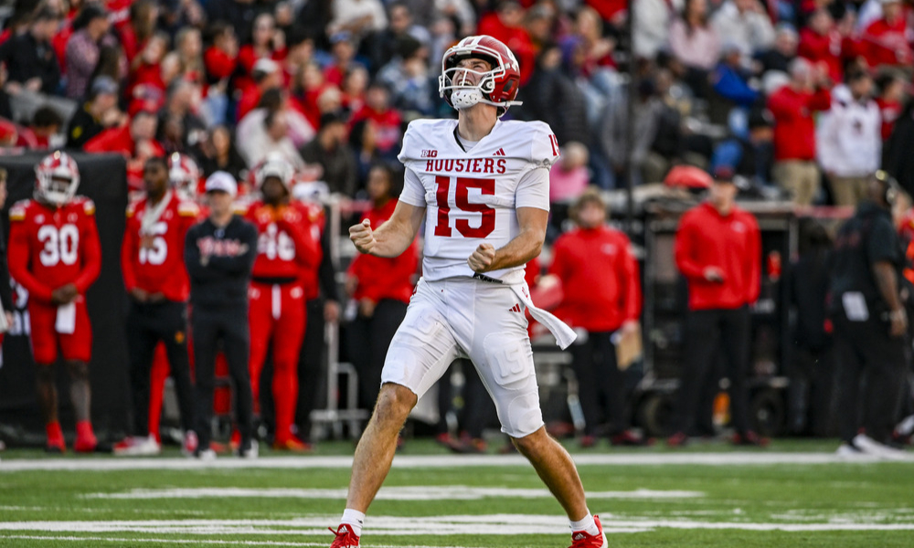 Indiana Hoosiers quarterback Fernando Mendoza celebrates after throwing a touchdown.