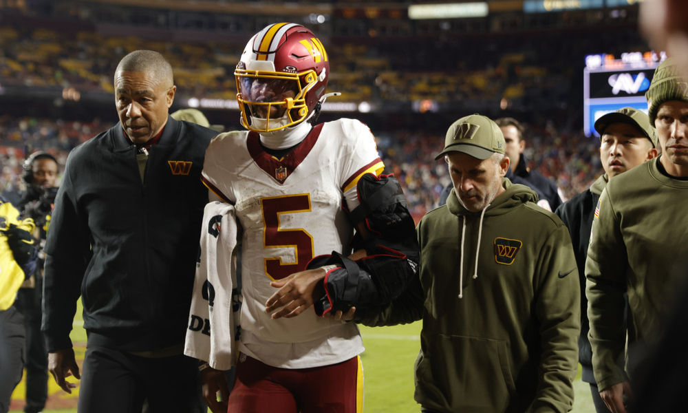 Washington Commanders quarterback Jayden Daniels walks to the locker room after sustaining an injury during Sunday's loss to the Seattle Seahawks.
