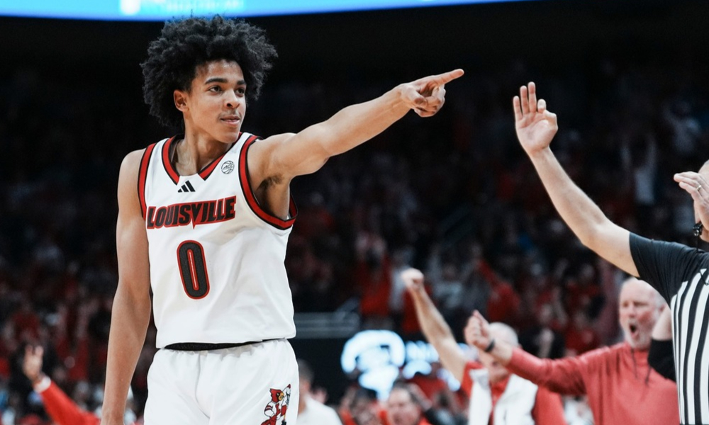 Louisville freshman Mikel Brown Jr. celebrates after making a shot.