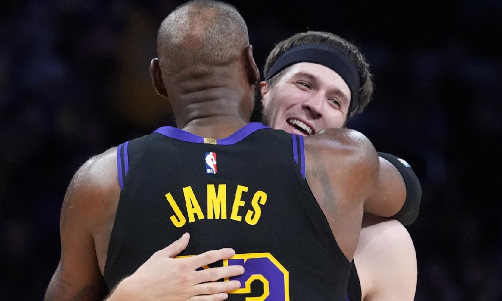 LeBron James hugs Austin Reaves