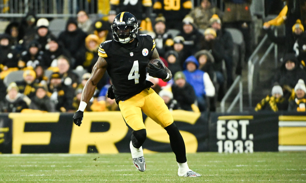 Pittsburgh Steelers wide receiver DK Metcalf runs down the field after making a catch.