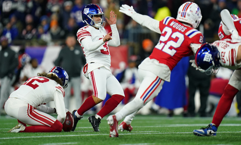 New York Giants kicker Younghoe Koo stumbles as he misses a field goal attempt.