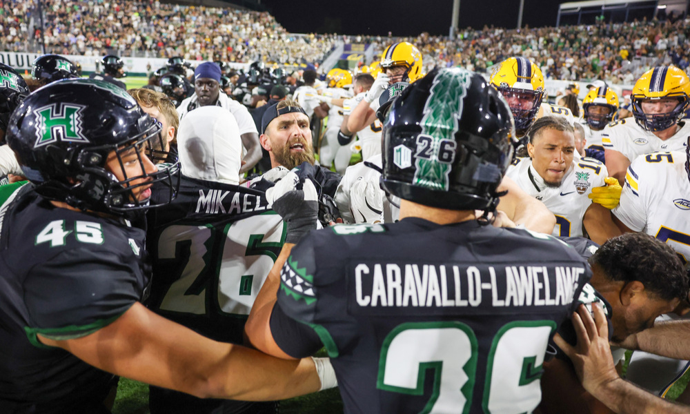A fight breaks out between the Hawaii Rainbow Warriors and California Golden Bears.