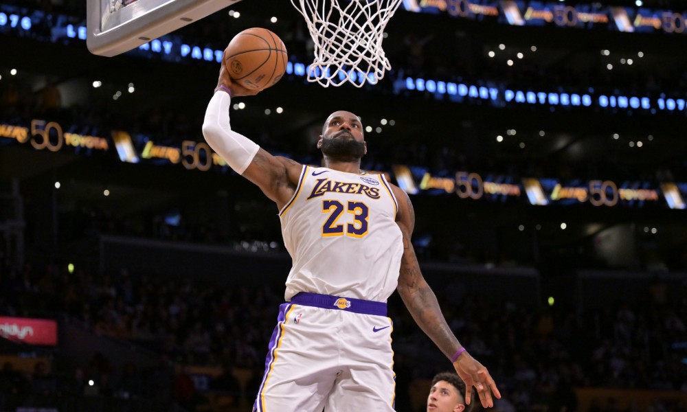 LeBron James dunks during Lakers Kings game