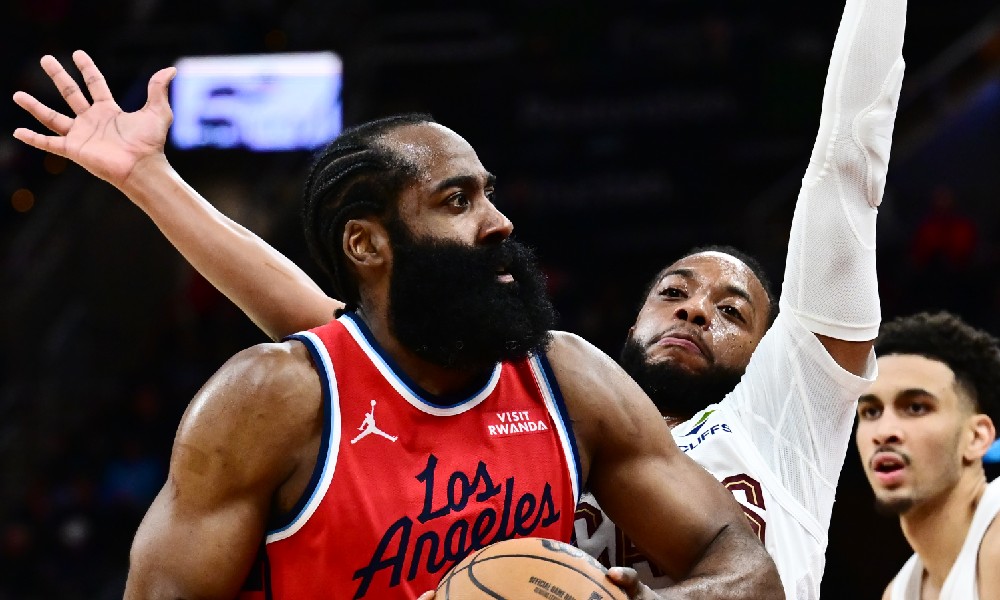 James Harden guarded by Darius Garland