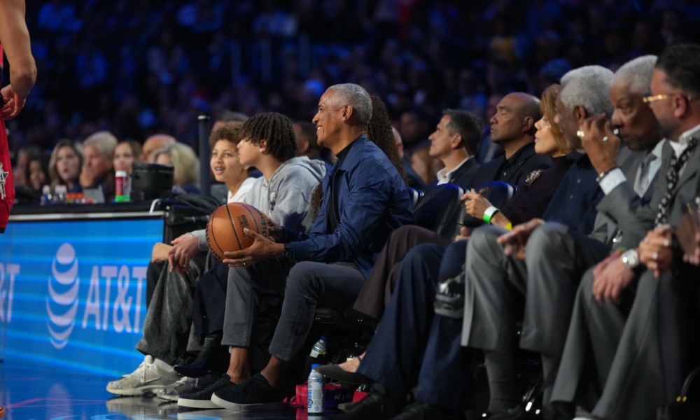 Former President Barack Obama watches NBA All-Star Game
