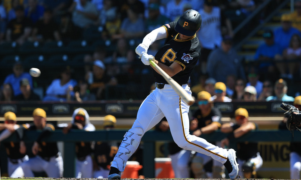 Pittsburgh Pirates’ Brandon Lowe swings at a pitch on Opening Day.
