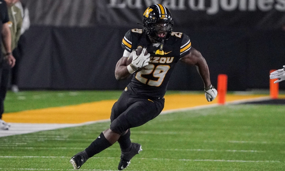 Missouri Tigers running back Ahmad Hardy (29) runs the ball against the Mississippi State Bulldogs during the second half of the game at Faurot Field at Memorial Stadium.