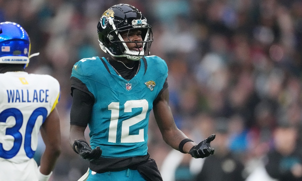 Oct 19, 2025; London, United Kingdom; Jacksonville Jaguars wide receiver Travis Hunter (12) reacts after a play against the Los Angeles Rams during the second half of an NFL International Series game at Wembley Stadium.