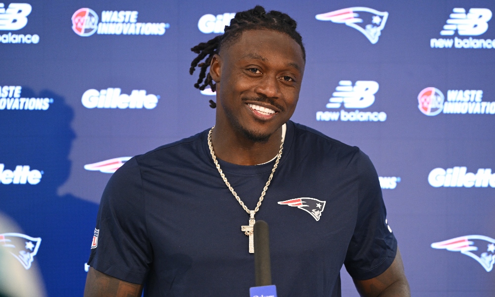 New England Patriots wide receiver A.J. Brown (1) speaks at a press conference after practice at the team's OTA at Gillette Stadium. Mandatory Credit: Eric Canha-Imagn Images