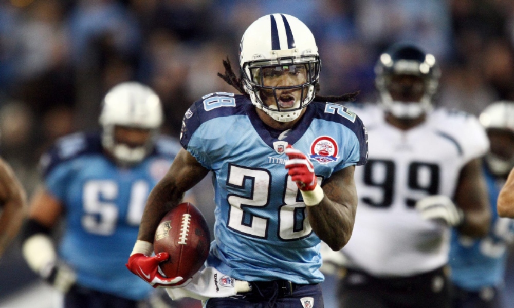 Tennessee Titans running back Chris Johnson (28) pulls away from Jacksonville Jaguars defense for a 52 yard touchdown run in the third quarter at LP Field on Nov. 1, 2009. The Titans defeated the Jaguars 30-13 for their first win of the season. George Walker IV / The Tennessean / USA TODAY NETWORK via Imagn Images