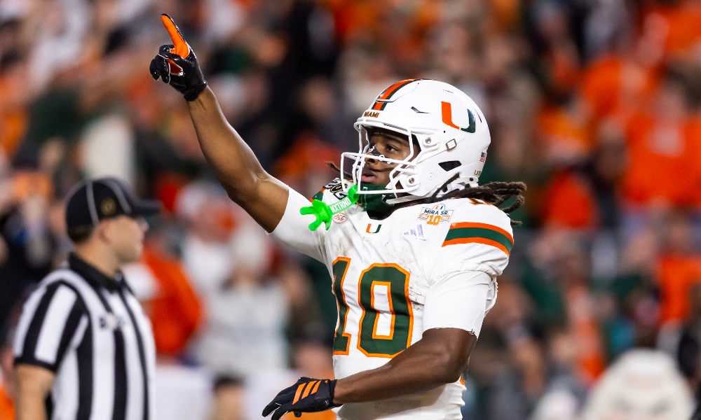 Miami Hurricanes wide receiver Malachi Toney (10) celebrates after scoring a touchdown against the Indiana Hoosiers during the College Football Playoff National Championship game at Hard Rock Stadium.