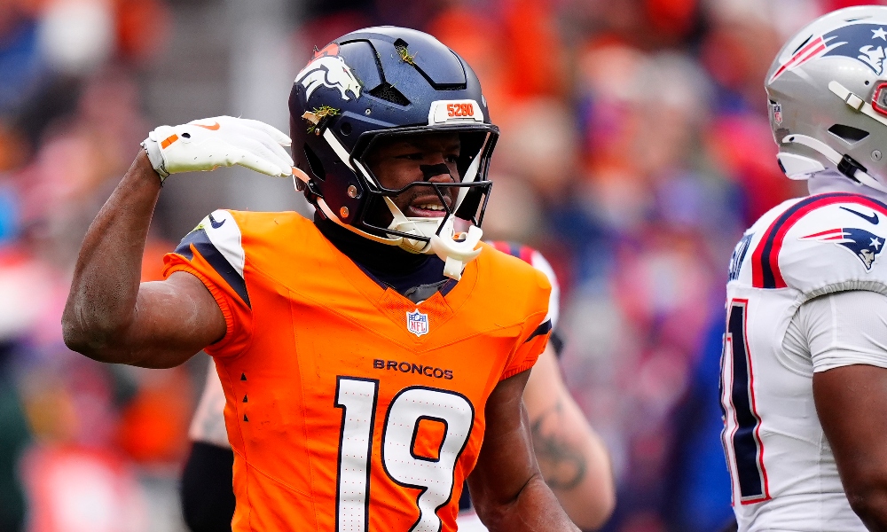 Denver Broncos wide receiver Marvin Mims Jr. (19) reacts after making a catch against the New England Patriots during the first half in the 2026 AFC Championship Game at Empower Field at Mile High. Mandatory Credit: Ron Chenoy-Imagn Images