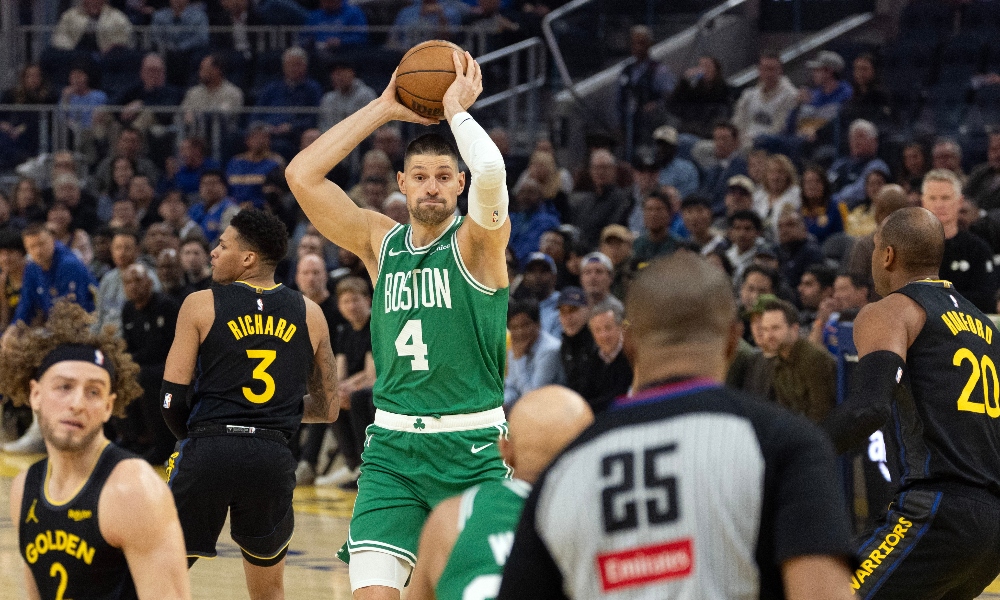 Boston Celtics center Nikola Vučević (4) looks for an open teammate during the first quarter against the Golden State Warriors at Chase Center. Mandatory Credit: D. Ross Cameron-Imagn Images