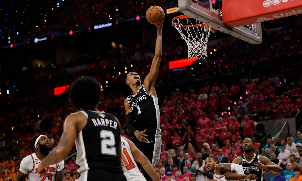 San Antonio Spurs forward Victor Wembanyama (1) shoots the ball against the New York Knicks in the second half during game one of the 2026 NBA Finals at Frost Bank Center. Mandatory Credit: Geoff Burke-Imagn Images