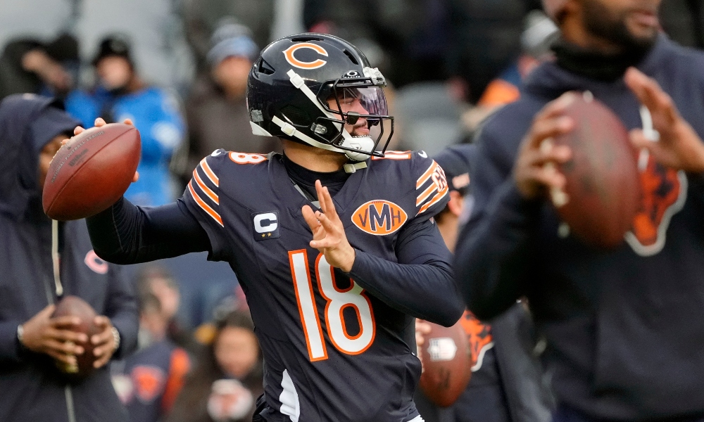 Chicago Bears quarterback Caleb Williams (18) warms up before the game between the Chicago Bears and the Detroit Lions at Soldier Field. Mandatory Credit: David Banks-Imagn Images
