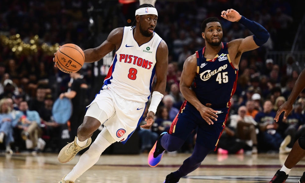 Detroit Pistons guard Caris LeVert (8) brings the ball up court against Cleveland Cavaliers guard Donovan Mitchell (45) during the first half of game four in the second round of the 2026 NBA Playoffs at Rocket Arena. Mandatory Credit: Ken Blaze-Imagn Images