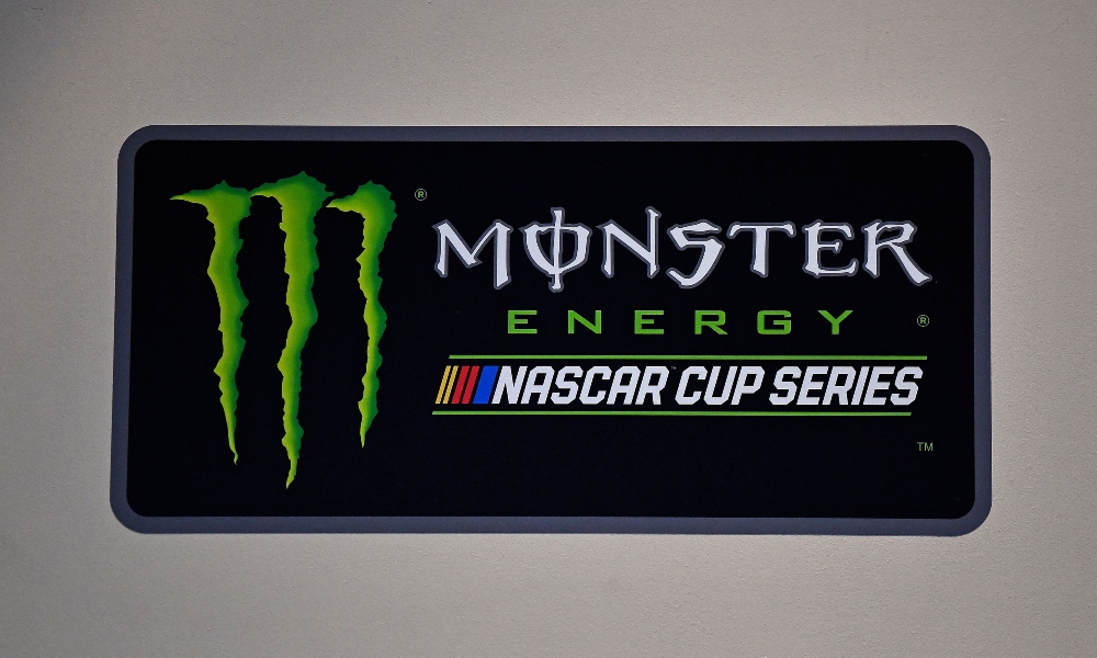 A detailed view of the Monster Energy NASCAR Cup Series logo on the wall during the media day for the Daytona 500 at Daytona International Speedway. Mandatory Credit: Jasen Vinlove-Imagn Images