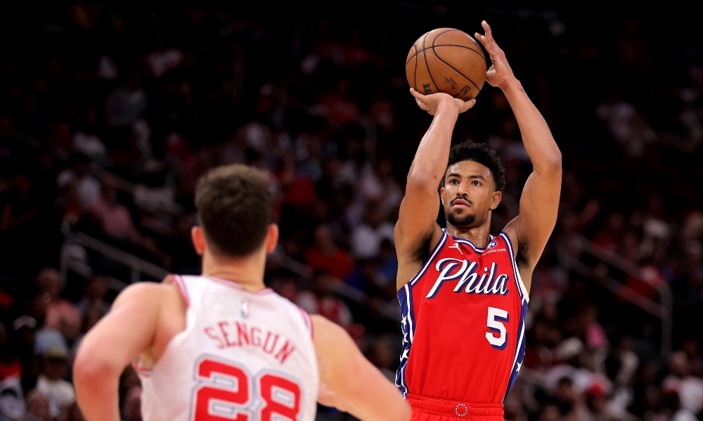 Philadelphia 76ers guard Quentin Grimes (5) shoots the ball against Houston Rockets center Alperen Sengun (28) during the fourth quarter at Toyota Center. Mandatory Credit: Erik Williams-Imagn Images