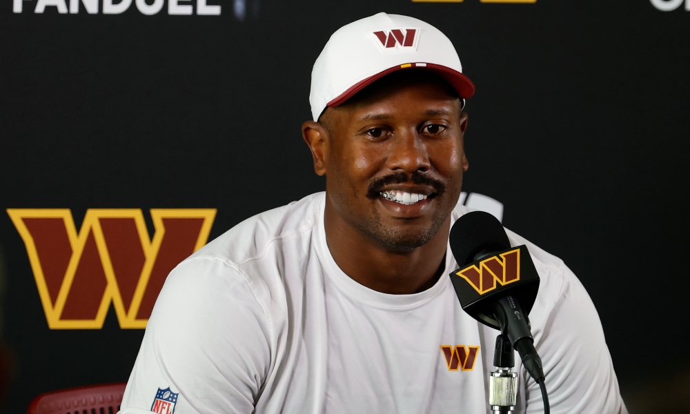 Washington Commanders outside linebacker Von Miller (24) speaks with the media after practice on day two of training camp at OrthoVirginia Training Center at Commanders Park. Mandatory Credit: Geoff Burke-Imagn Images